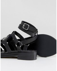 schwarze flache Sandalen aus Leder von Asos