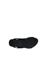 schwarze flache Sandalen aus Leder von Jana