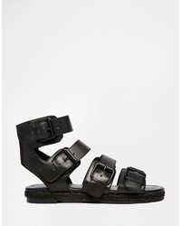 schwarze flache Sandalen aus Leder