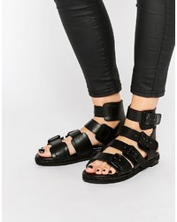 schwarze flache Sandalen aus Leder