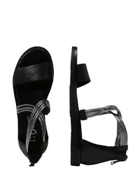 schwarze flache Sandalen aus Leder von Mjus