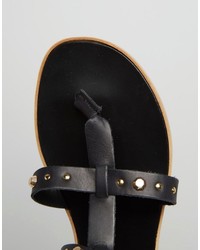 schwarze flache Sandalen aus Leder von Faith