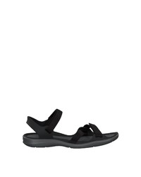 schwarze flache Sandalen aus Segeltuch von Crocs