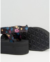 schwarze flache Sandalen mit Blumenmuster von Teva