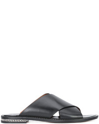 schwarze flache Sandalen mit geometrischem Muster