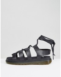 schwarze flache Sandalen von Dr. Martens