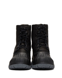 schwarze flache Stiefel mit einer Schnürung aus Leder von Diemme