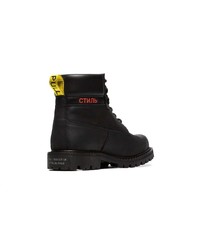 schwarze flache Stiefel mit einer Schnürung aus Leder von Heron Preston