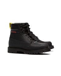 schwarze flache Stiefel mit einer Schnürung aus Leder von Heron Preston