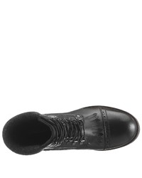 schwarze flache Stiefel mit einer Schnürung aus Leder von Eddie Bauer