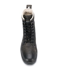 schwarze flache Stiefel mit einer Schnürung aus Leder von Diesel