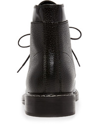 schwarze flache Stiefel mit einer Schnürung aus Leder von Maison Margiela
