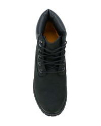 schwarze flache Stiefel mit einer Schnürung aus Wildleder von Timberland