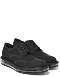 schwarze Gummi Brogues von Prada