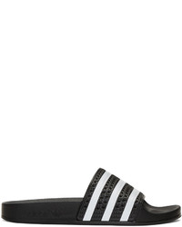 schwarze Gummi flache Sandalen von adidas