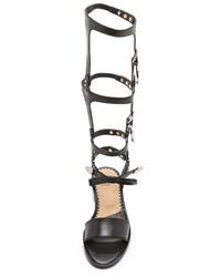 schwarze hohe Römersandalen aus Leder