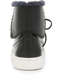 schwarze hohe Sneakers aus Leder von Thakoon