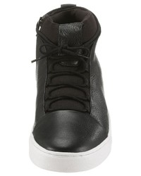 schwarze hohe Sneakers aus Leder von PETROLIO