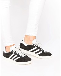 schwarze hohe Sneakers mit Schlangenmuster