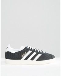 schwarze hohe Sneakers mit Schlangenmuster von adidas