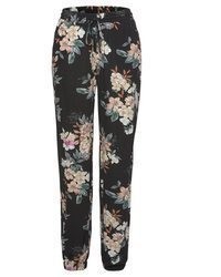 schwarze Hose mit Blumenmuster von Lascana