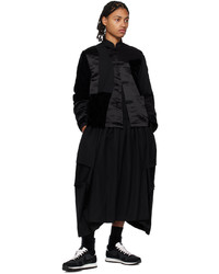 schwarze Jacke mit einer Kentkragen und Knöpfen von Black Comme Des Garçons