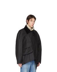 schwarze Jacke mit einer Kentkragen und Knöpfen von Y/Project