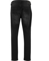 schwarze Jeans mit Destroyed-Effekten von 2Y Premium