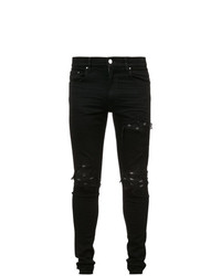 schwarze Jeans mit Destroyed-Effekten von Amiri