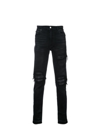 schwarze Jeans mit Destroyed-Effekten von Amiri