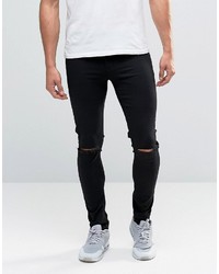 schwarze Jeans mit Destroyed-Effekten von Asos