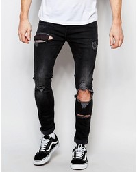 schwarze Jeans mit Destroyed-Effekten von Asos