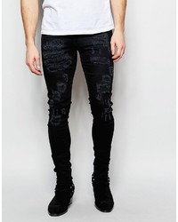 schwarze Jeans mit Destroyed-Effekten von Asos