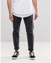 schwarze Jeans mit Destroyed-Effekten von Asos