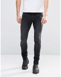 schwarze Jeans mit Destroyed-Effekten von Asos