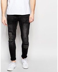 schwarze Jeans mit Destroyed-Effekten von Asos