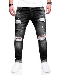 schwarze Jeans mit Destroyed-Effekten von behype