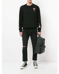 schwarze Jeans mit Destroyed-Effekten von Ksubi