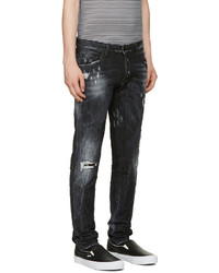 schwarze Jeans mit Destroyed-Effekten von DSQUARED2