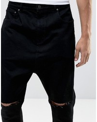 schwarze Jeans mit Destroyed-Effekten von Asos