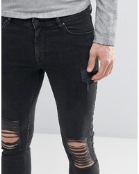 schwarze Jeans mit Destroyed-Effekten von Asos