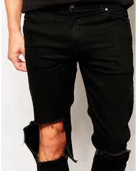 schwarze Jeans mit Destroyed-Effekten von Asos