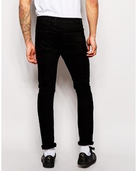 schwarze Jeans mit Destroyed-Effekten von Asos