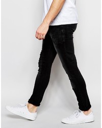 schwarze Jeans mit Destroyed-Effekten von Asos