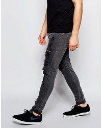 schwarze Jeans mit Destroyed-Effekten von Asos