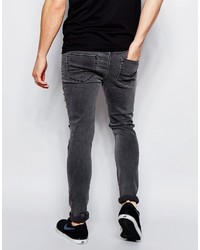 schwarze Jeans mit Destroyed-Effekten von Asos