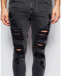 schwarze Jeans mit Destroyed-Effekten von Asos