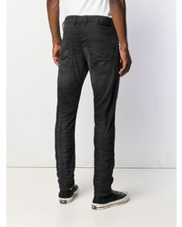 schwarze Jeans mit Destroyed-Effekten von Diesel