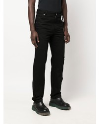 schwarze Jeans mit Destroyed-Effekten von Heliot Emil