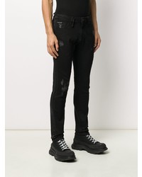 schwarze Jeans mit Destroyed-Effekten von Philipp Plein